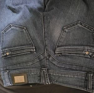 Jolt pants, low rise, and dark blue.